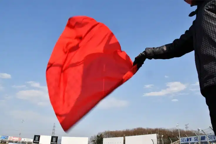 Navigating Safety and Rules: A Legal Examination of Tsunoda's Red Flag Overtake Penalty at the F1 Canadian GP