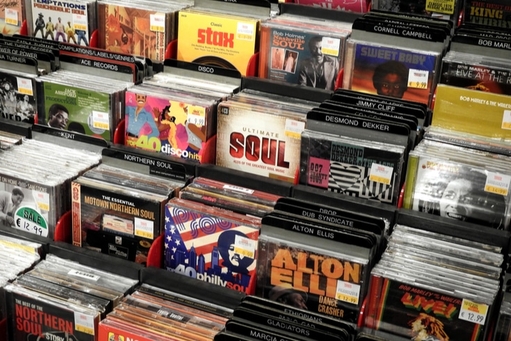 CD albums lined up in a store