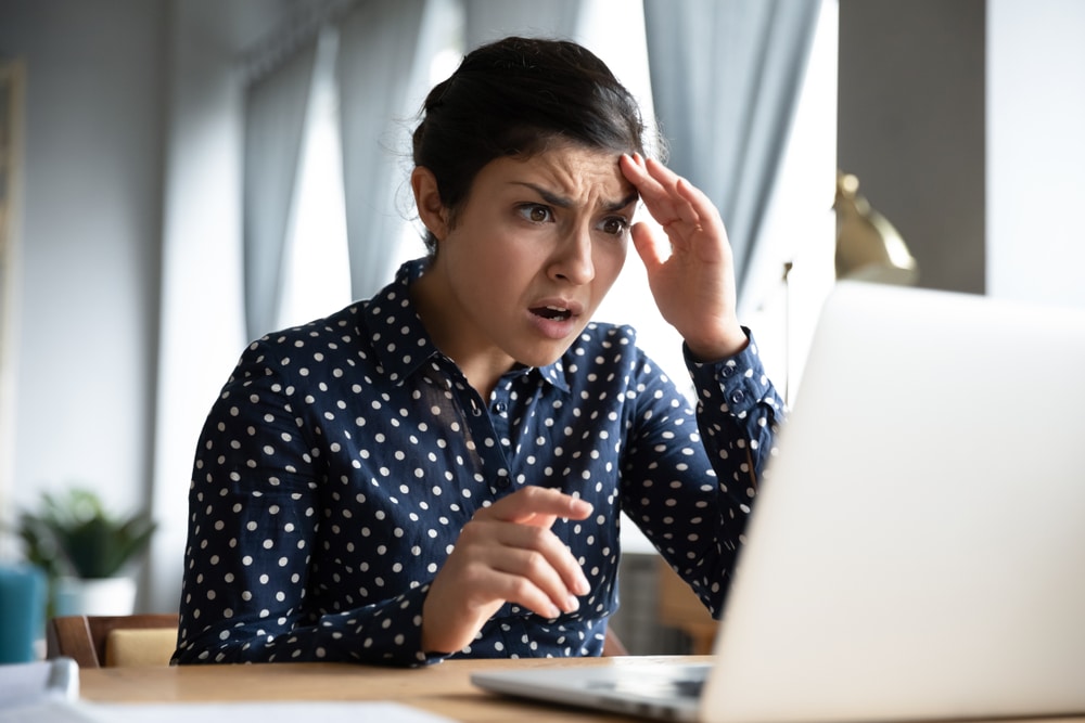 A woman researching copyright on a PC