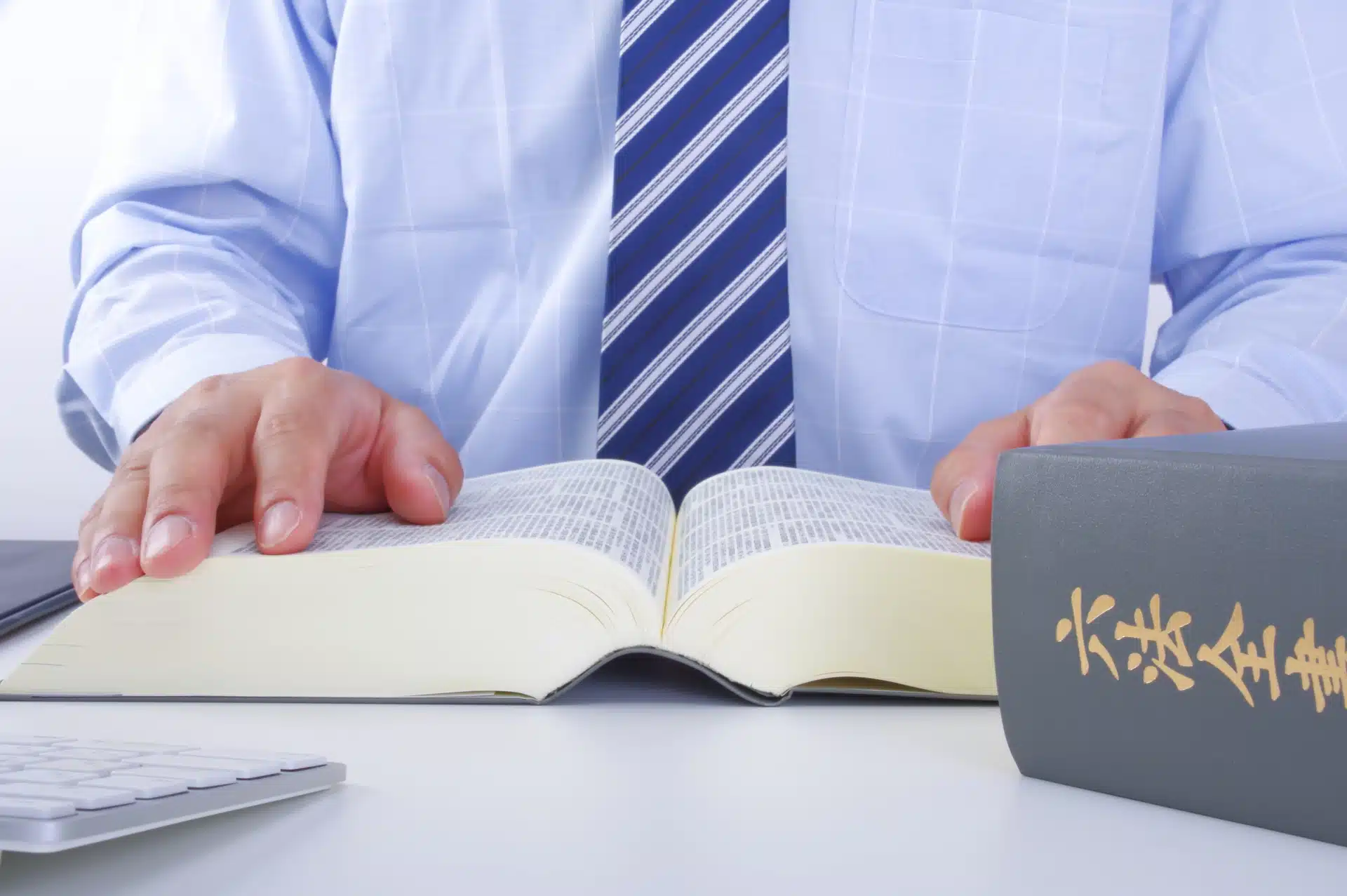 Man reading the Roppo Zensho